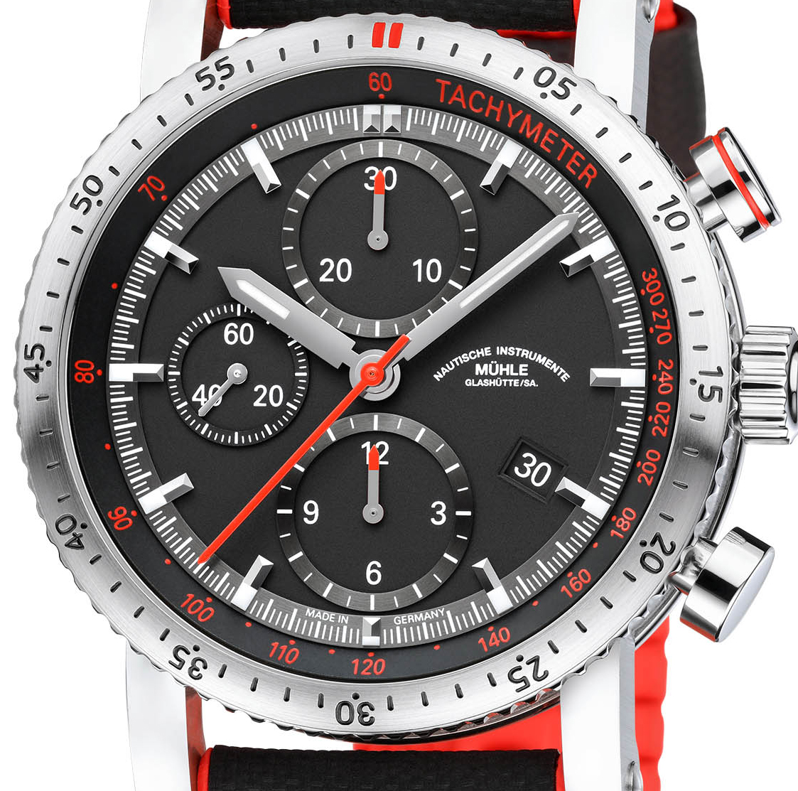 The chronograph hands are highlighted in red, matching the numerals on the tachymeter scale.